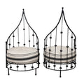 A Pair of Wrought Iron Barrel Chairs