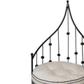 A Pair of Wrought Iron Barrel Chairs