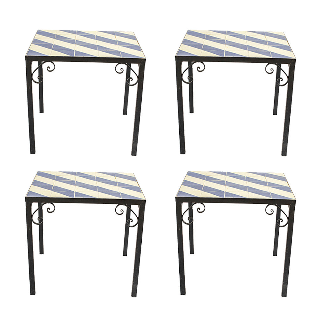 A Set of Four Vintage Wrought Iron Outdoor Side Tables with Blue and White Glazed Tile Tops