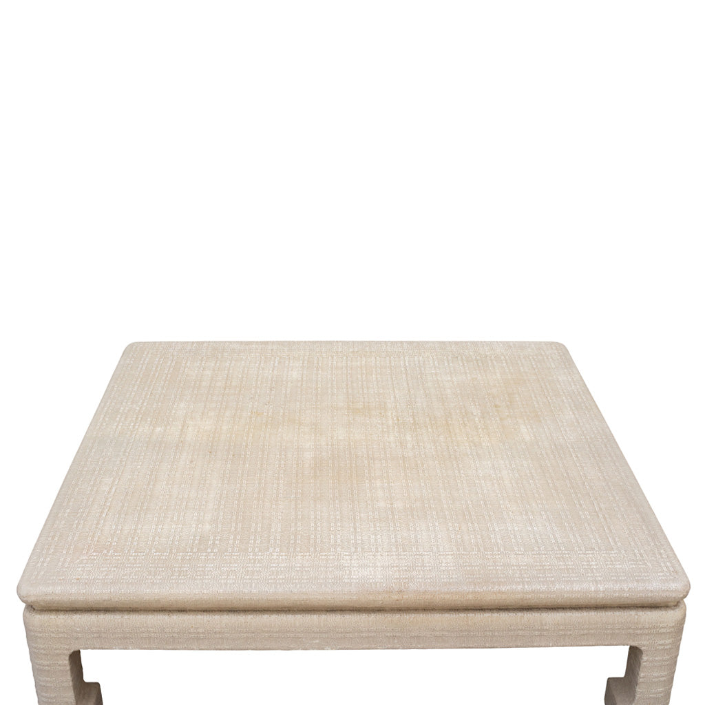 An Oversized Grass Cloth Wrapped Coffee Table