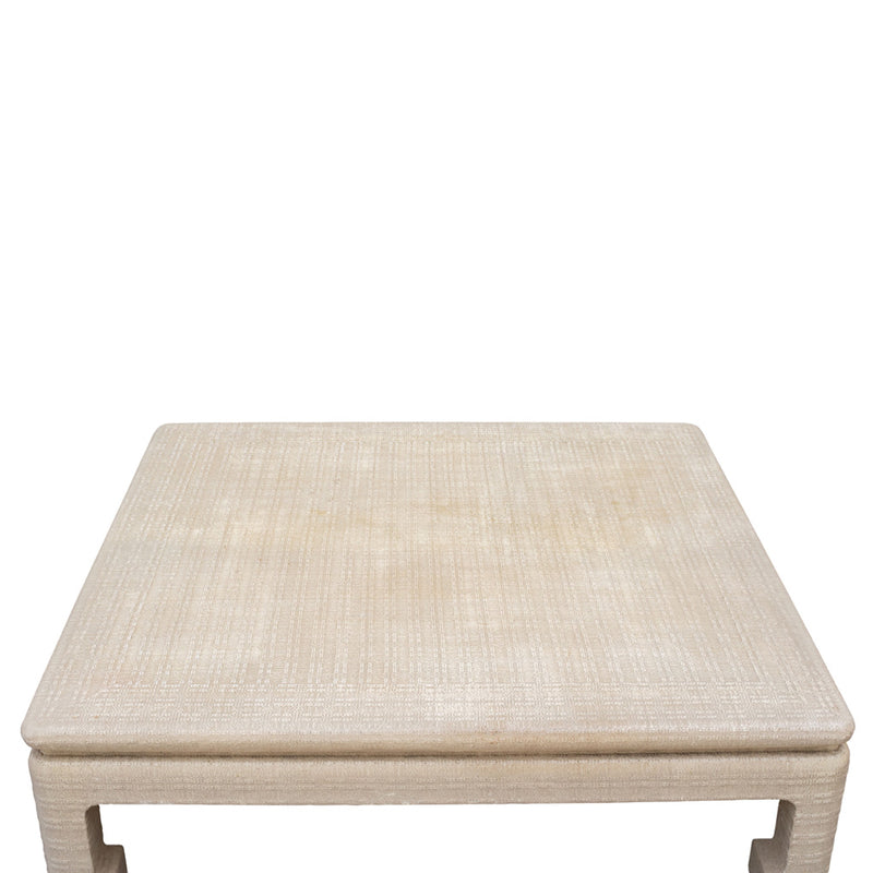 An Oversized Grass Cloth Wrapped Coffee Table