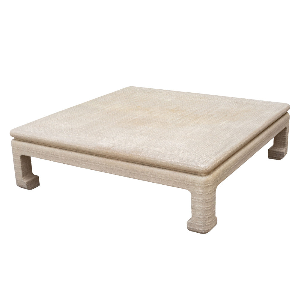 An Oversized Grass Cloth Wrapped Coffee Table