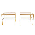 A Pair of Two-Tier Brass Side Tables with Glass Shelves