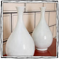 A Pair of White Crackle-Glazed Pear or "Yuhuchunping" Shaped Vases